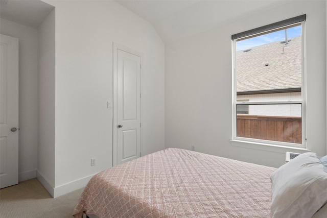 1812 Welker Dr, Van Alstyne, TX 75495 - carpeted bedroom featuring vaulted ceiling and baseboards