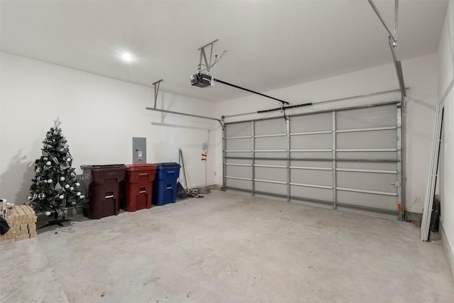 1812 Welker Dr, Van Alstyne, TX 75495 - garage with electric panel and a garage door opener