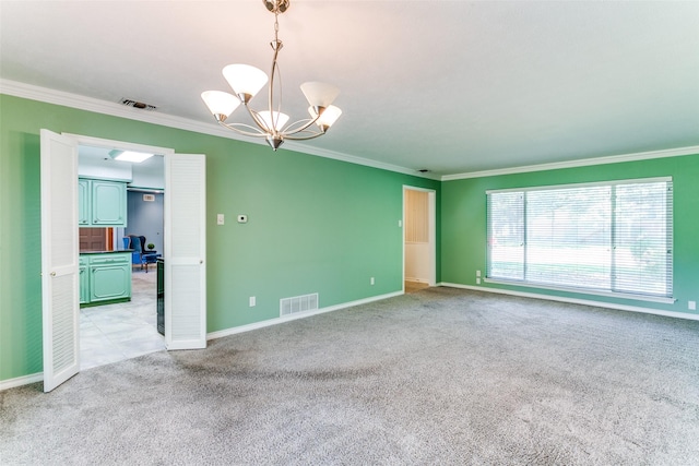 907 Glen Dell Dr, Irving, TX 75061 - empty room featuring light carpet, ornamental molding, and a chandelier