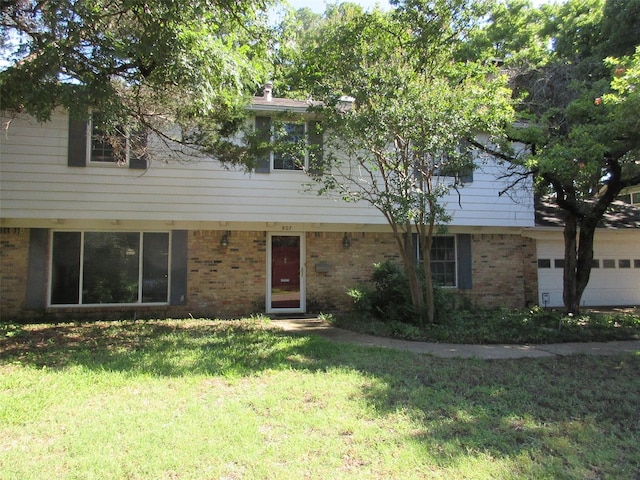 907 Glen Dell Dr, Irving, TX 75061 - townhome / multi-family property featuring brick siding and a front yard