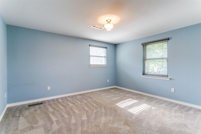 907 Glen Dell Dr, Irving, TX 75061 - carpeted spare room featuring baseboards