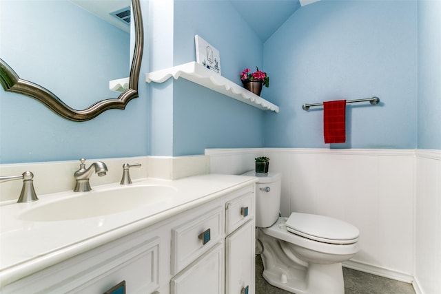 907 Glen Dell Dr, Irving, TX 75061 - bathroom with vanity and a wainscoted wall