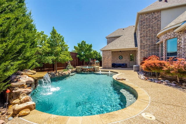 11626 Capitan Ln, Frisco, TX 75033 - view of pool with a fenced backyard, a pool with connected hot tub, and a patio area