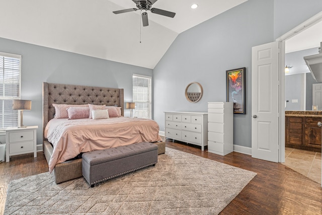 2433 Mallard Dr, Little Elm, TX 75068 - bedroom with wood finished floors, baseboards, ensuite bath, high vaulted ceiling, and recessed lighting
