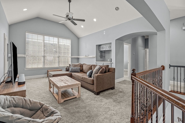 2433 Mallard Dr, Little Elm, TX 75068 - living room with arched walkways, a ceiling fan, lofted ceiling, carpet, and recessed lighting