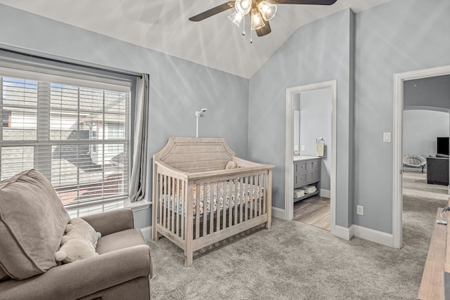 2433 Mallard Dr, Little Elm, TX 75068 - bedroom featuring carpet, vaulted ceiling, baseboards, a ceiling fan, and ensuite bathroom