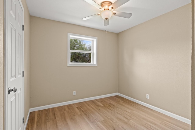 310 Reynolds, Pittsburg, TX 75686 - unfurnished bedroom with light wood finished floors, baseboards, and ceiling fan