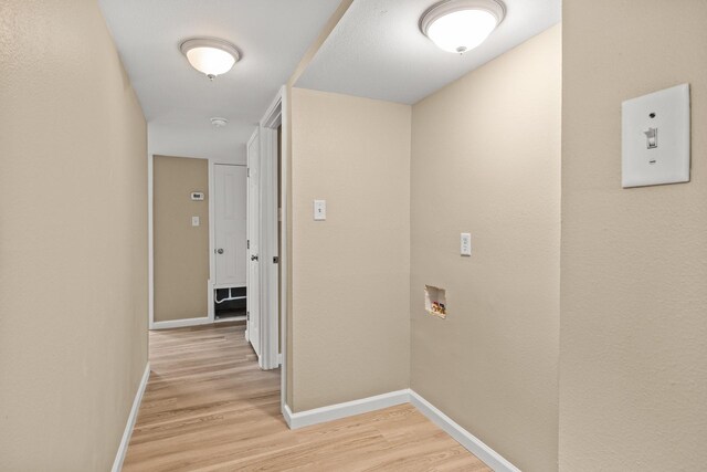 310 Reynolds, Pittsburg, TX 75686 - hall featuring light wood-style floors and baseboards