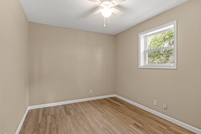 310 Reynolds, Pittsburg, TX 75686 - unfurnished room with light wood-style floors, baseboards, and ceiling fan