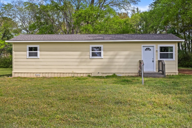 310 Reynolds, Pittsburg, TX 75686 - view of front of home with crawl space and a front yard