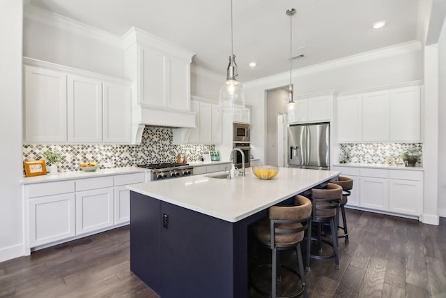 424 Trigger Trl, Argyle, TX 76226 - kitchen with appliances with stainless steel finishes, tasteful backsplash, a kitchen island with sink, light countertops, and white cabinets