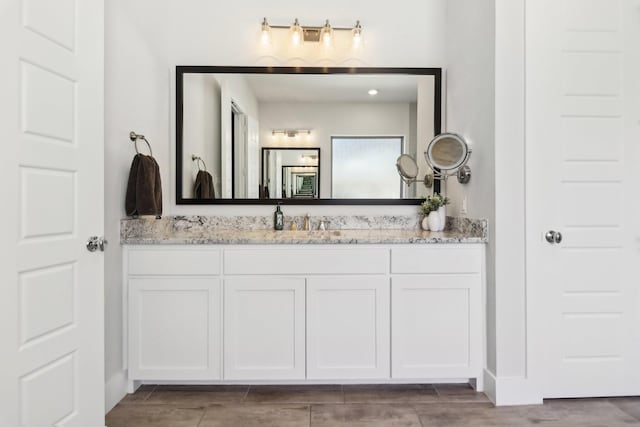 424 Trigger Trl, Argyle, TX 76226 - bathroom with vanity and wood tiled floors