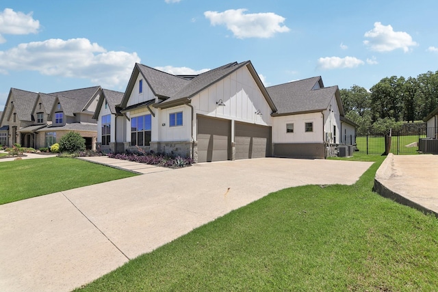 424 Trigger Trl, Argyle, TX 76226 - view of side of home with board and batten siding, driveway, an attached garage, and roof with shingles