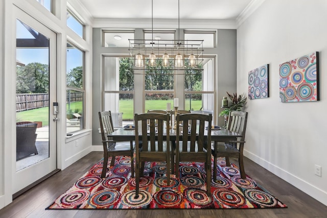 424 Trigger Trl, Argyle, TX 76226 - dining room with ornamental molding, a chandelier, and dark wood-style flooring