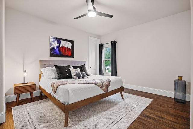 655 Creekway Dr, Irving, TX 75039 - bedroom featuring baseboards, wood finished floors, and a ceiling fan