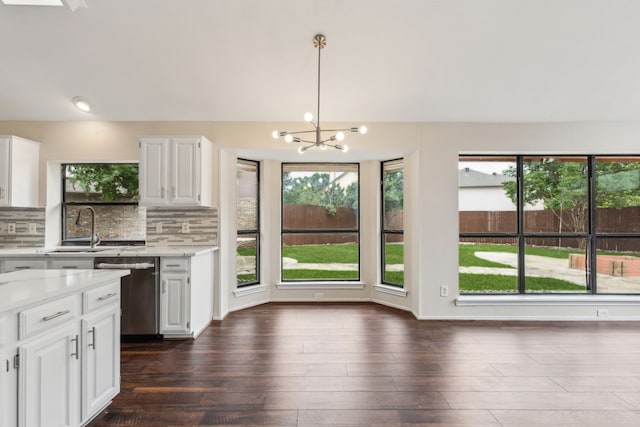 4103 Bendwood Ln, Dallas, TX 75287 - kitchen with dishwasher, a sink, plenty of natural light, and a chandelier