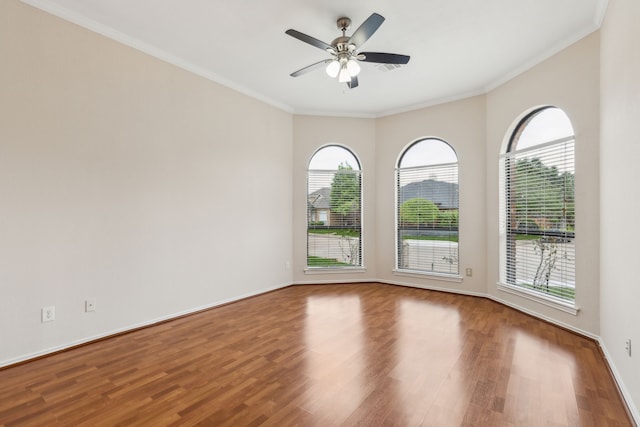 4103 Bendwood Ln, Dallas, TX 75287 - spare room with wood finished floors, crown molding, a ceiling fan, and baseboards