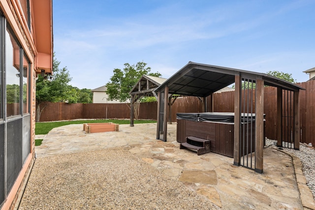 4103 Bendwood Ln, Dallas, TX 75287 - fenced backyard with a gazebo, a hot tub, and a patio