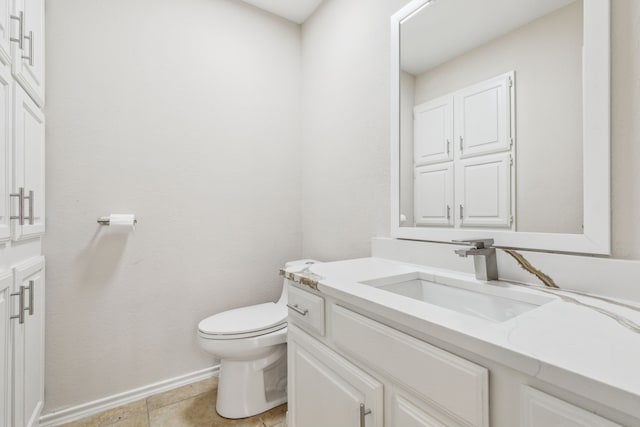4103 Bendwood Ln, Dallas, TX 75287 - half bath with toilet, vanity, tile patterned flooring, and baseboards