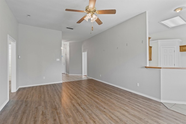 1039 Spring Hill Dr, Saginaw, TX 76179 - unfurnished room with light wood finished floors and ceiling fan