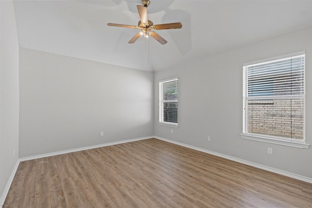 1039 Spring Hill Dr, Saginaw, TX 76179 - empty room featuring light wood-type flooring, ceiling fan, and lofted ceiling