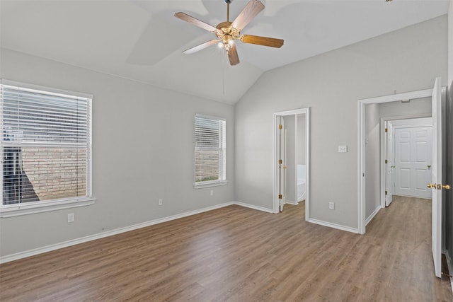 1039 Spring Hill Dr, Saginaw, TX 76179 - unfurnished bedroom featuring vaulted ceiling, wood finished floors, and a ceiling fan