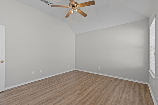 1039 Spring Hill Dr, Saginaw, TX 76179 - unfurnished room with lofted ceiling, light wood-type flooring, and ceiling fan
