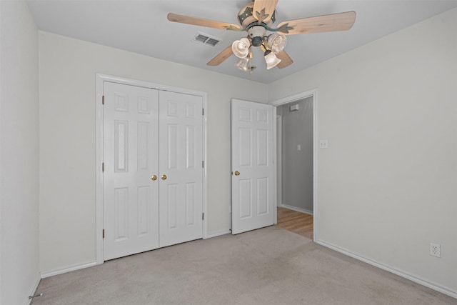 1039 Spring Hill Dr, Saginaw, TX 76179 - unfurnished bedroom with carpet, a closet, and a ceiling fan