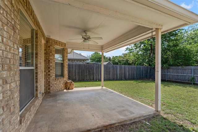 1039 Spring Hill Dr, Saginaw, TX 76179 - fenced backyard featuring ceiling fan and a patio