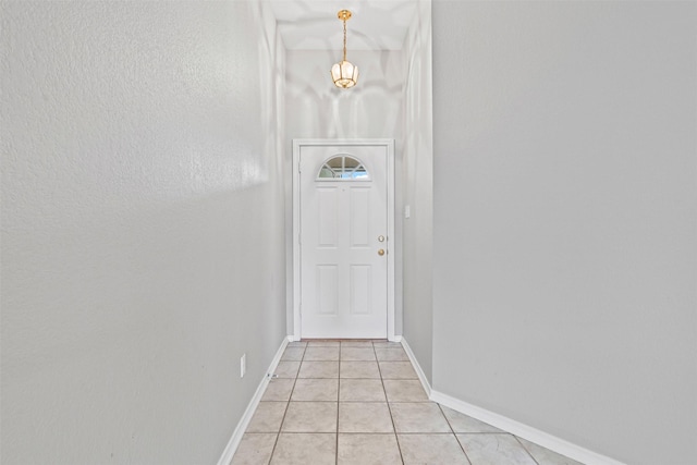 1039 Spring Hill Dr, Saginaw, TX 76179 - entryway featuring light tile patterned floors and baseboards