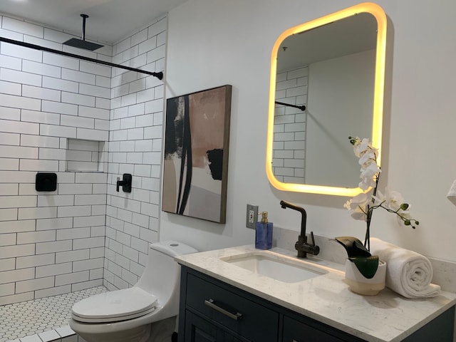 1122 Jackson St Unit 416, Dallas, TX 75202 - full bath with vanity, tiled shower, and toilet
