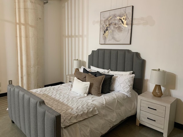 1122 Jackson St Unit 416, Dallas, TX 75202 - bedroom with baseboards