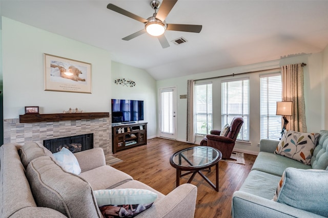 9912 Fillmore Dr, Mckinney, TX 75072 - living area featuring lofted ceiling, plenty of natural light, ceiling fan, wood finished floors, and baseboards