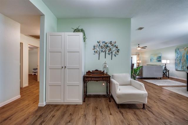 9912 Fillmore Dr, Mckinney, TX 75072 - sitting room featuring wood finished floors, ceiling fan, and baseboards