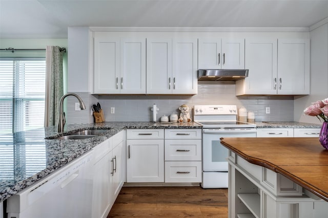9912 Fillmore Dr, Mckinney, TX 75072 - kitchen with white appliances, a sink, under cabinet range hood, white cabinetry, and dark wood finished floors