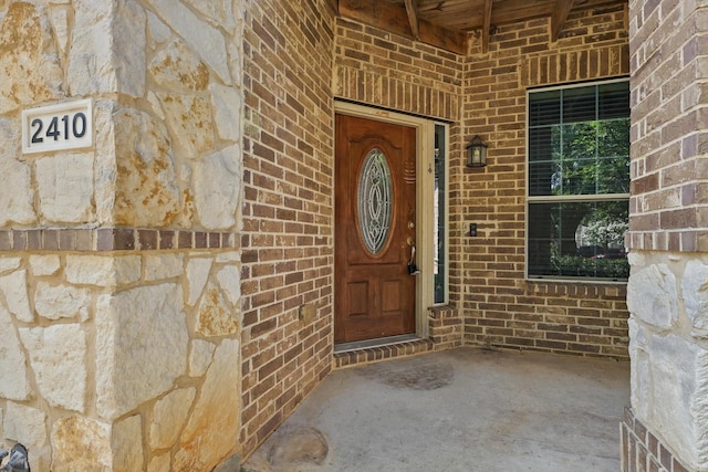 2410 Honey Dr, Arlington, TX 76001 - property entrance featuring brick siding