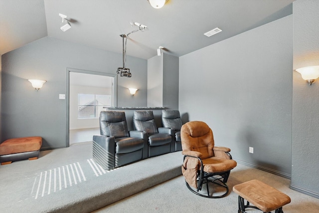 2410 Honey Dr, Arlington, TX 76001 - home theater room featuring carpet flooring and lofted ceiling