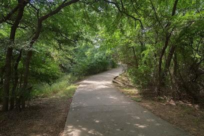 2410 Honey Dr, Arlington, TX 76001 - view of road featuring a wooded view