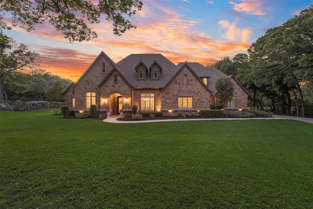 105 Orion Ct, Aurora, TX 76078 - french country home featuring stone siding, a front lawn, and brick siding
