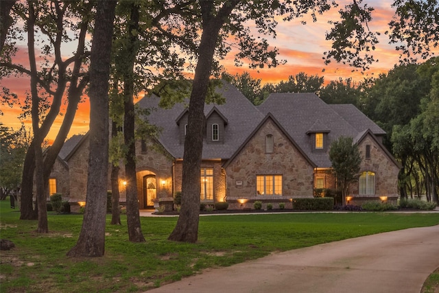 105 Orion Ct, Aurora, TX 76078 - french country home with stone siding and a lawn