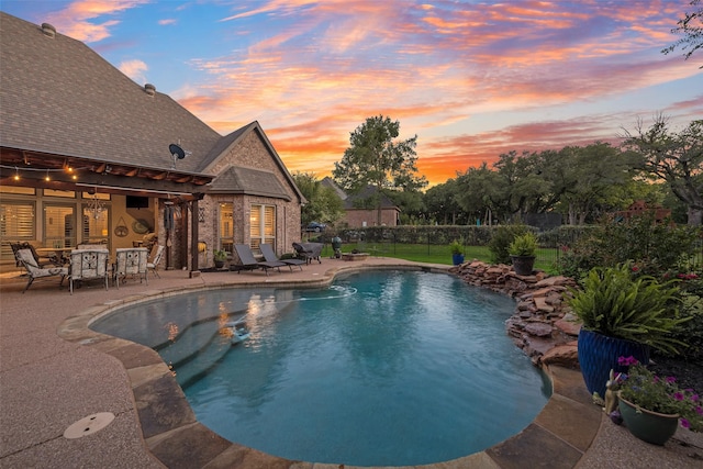 105 Orion Ct, Aurora, TX 76078 - pool at dusk featuring a patio area