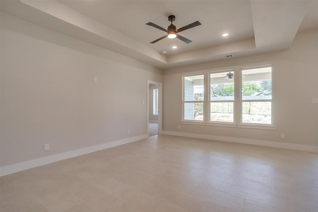 2602 23rd St, Fort Worth, TX 76106 - unfurnished room with baseboards, a tray ceiling, ceiling fan, and recessed lighting