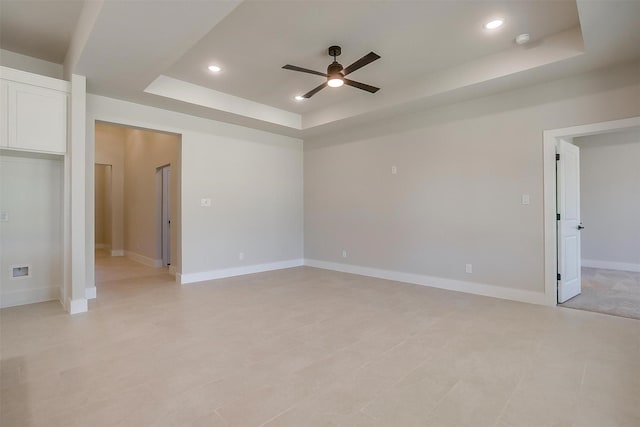 2602 23rd St, Fort Worth, TX 76106 - spare room with a raised ceiling, a ceiling fan, recessed lighting, baseboards, and a smoke detector