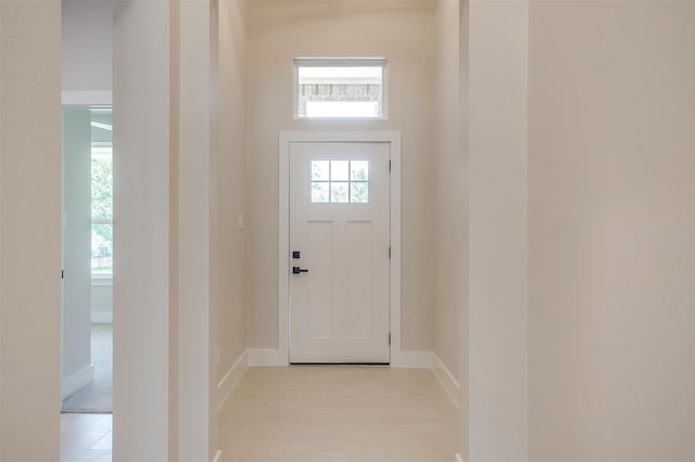 2602 23rd St, Fort Worth, TX 76106 - entryway featuring light tile patterned floors and baseboards
