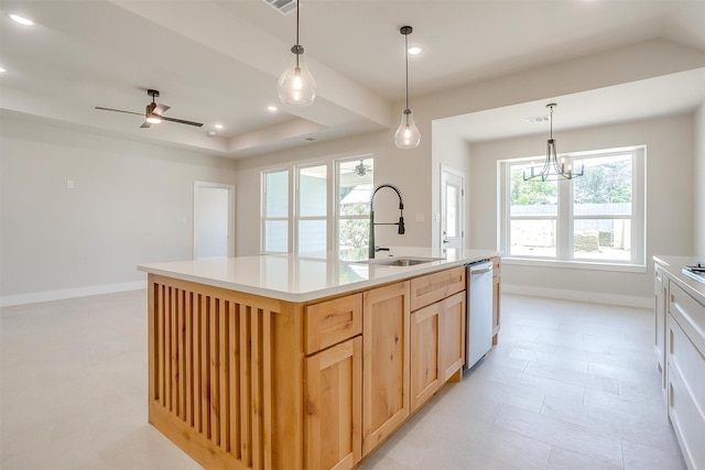 2602 23rd St, Fort Worth, TX 76106 - kitchen featuring a sink, stainless steel dishwasher, light brown cabinets, light countertops, and a chandelier