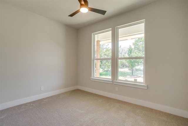 2602 23rd St, Fort Worth, TX 76106 - carpeted empty room with baseboards and ceiling fan