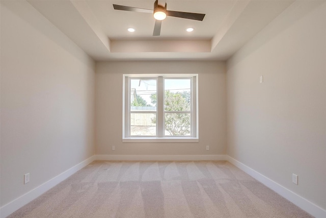2602 23rd St, Fort Worth, TX 76106 - empty room featuring a raised ceiling, light carpet, recessed lighting, ceiling fan, and baseboards