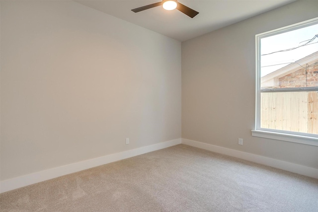 2602 23rd St, Fort Worth, TX 76106 - empty room with light colored carpet, ceiling fan, and baseboards
