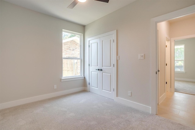 2602 23rd St, Fort Worth, TX 76106 - unfurnished bedroom featuring light carpet, baseboards, ceiling fan, and a closet