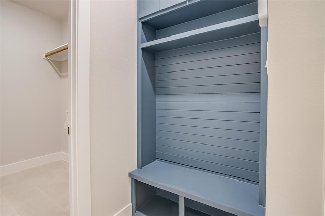 2602 23rd St, Fort Worth, TX 76106 - mudroom with baseboards and tile patterned flooring
